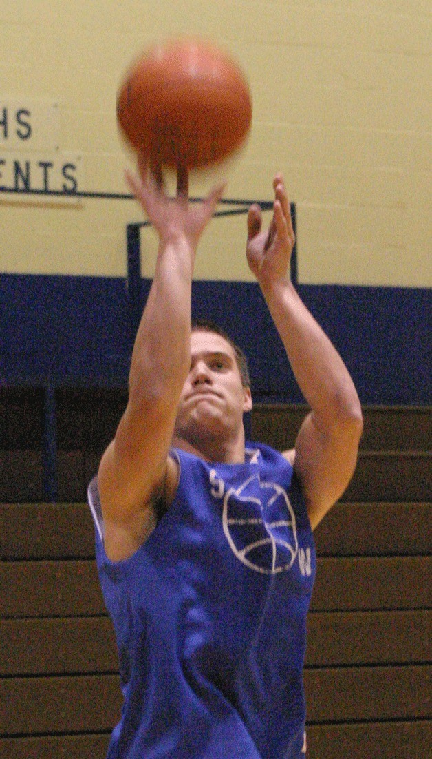 Austin Bennett warms up his jumper during practice. Bennett is returning to the veteran squad after a two-year hiatus.