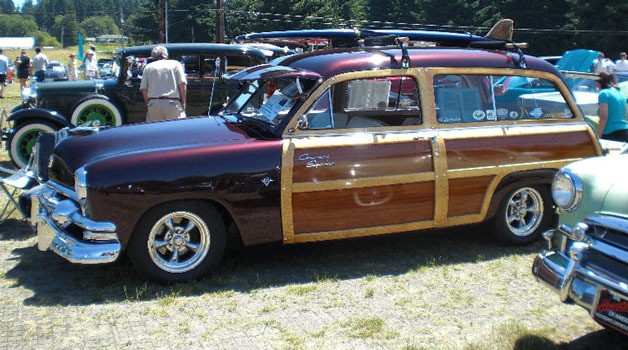 A variety of vintage cars are lined up near Bayview Community Hall for the Cool Bayview Nights car show.