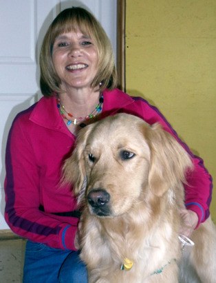 Barbara Guetlin poses with her golden retriever Max. Max is a recent graduate of the Summit Assistance Dogs program