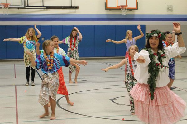 Kathleen Landel leads sixth-graders in hula dancing on the final day of the “Start Dreaming” camp sponsored by Soroptimist International of South Whidbey Island.