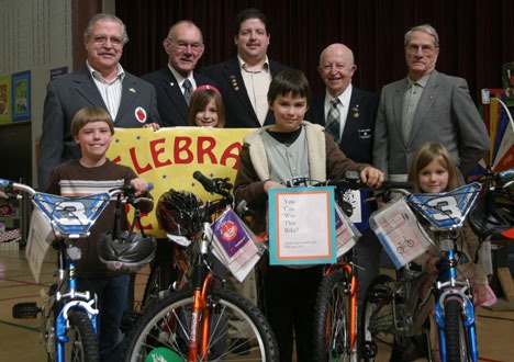 South Whidbey Elementary School students pose with the new bicycles they won in a school reading contest. From left are Jacob Breeden