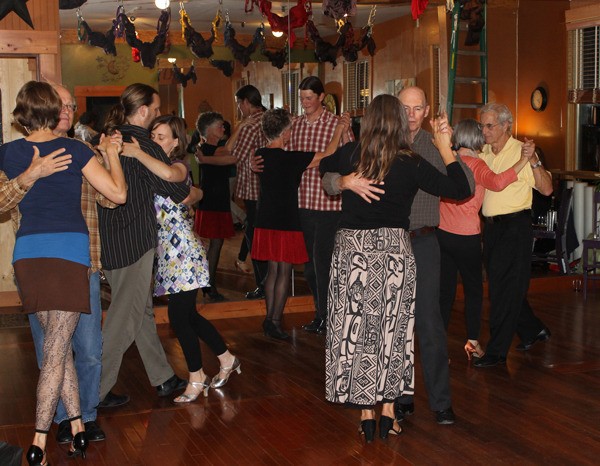 Dancers practice their moves at a recent tango class. The Whidbey Island Tango Festival will take place in Coupeville Nov. 7-9.