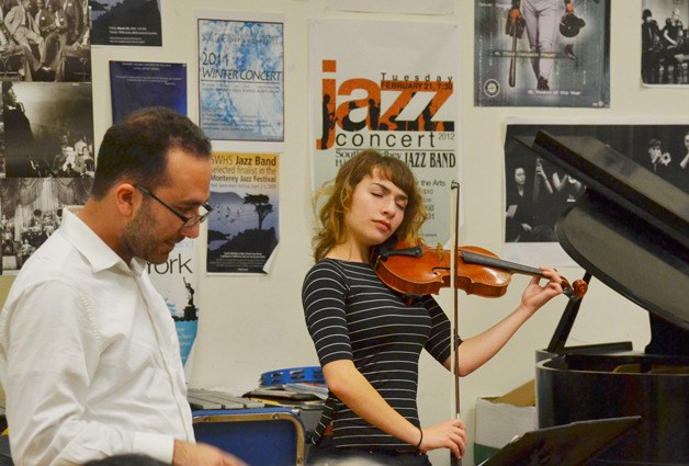 Tigran Arakelyan and Gloria Ferry-Brennan rehearse for the Whidbey Island Community Orchestra’s upcoming performance “Italian Spring
