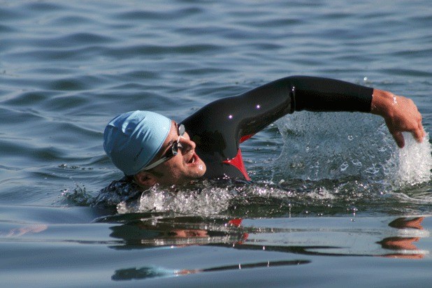 Steve Polucha swims toward the shore and the finish line at the inaugural Whidbey Adventure Swim on Saturday. The Kirkland resident won the 1.2-mile race in less than in less than 30 minutes.