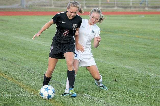 South Whidbey freshman Mallory Drye competes for possession of the ball during a match against Cedarcrest in September.
