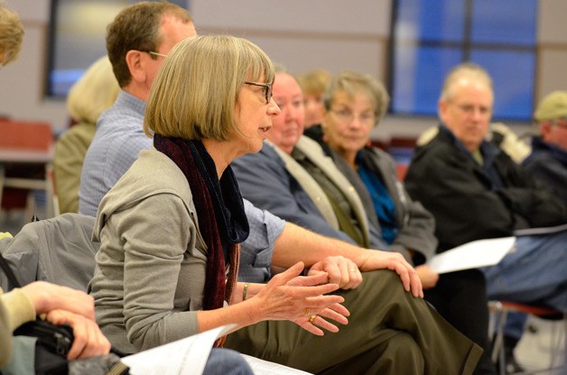 Kim Drury of Langley asks state lawmakers about parks funding during a legislative roundup on South Whidbey last week.