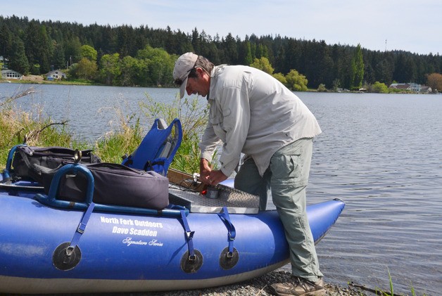 Robert McLee packs up after a morning of fishing on Lone Lake on Thursday