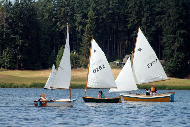 Sailing students ride dinghy boats last July. The 2016 Whidbey Cup Regatta is today.