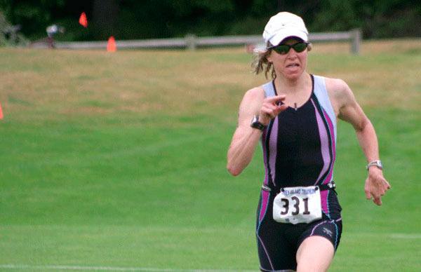 Stacia McInnes sprints toward her fifth Whidbey Triathlon title in 2011.