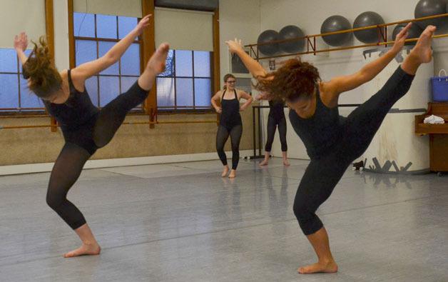 Madyson Hunter and Faith O’Brochta rehearse a company dance piece by choreographer Aaron Cash to be performed Feb. 28