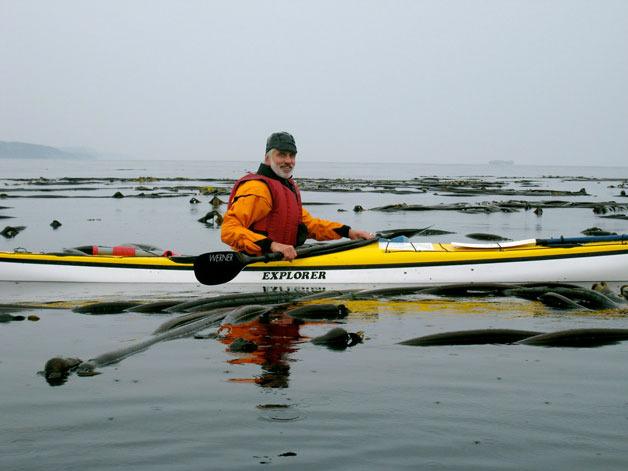 Kurt Hoelting kayaks during his year-without-a-car journey.