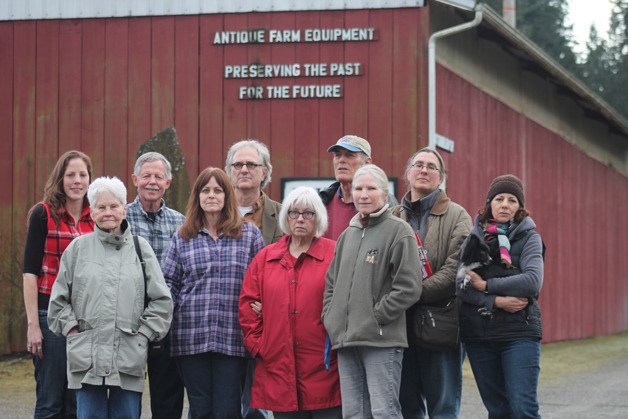 Standing in front of the Gary Gabelein Sr. Building that houses relics from Island County’s past like tractors and tills