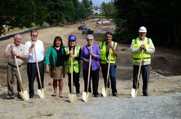 Sunny View Village dignitaries pose for a groundbreaking ceremony in Freeland last month. Pedestrian concerns will be the subject of a meeting later this month.