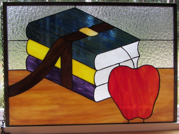 A new stained-glass window by local artists Calli Beers and David Beers will be installed in a north side window of the Langley Library.