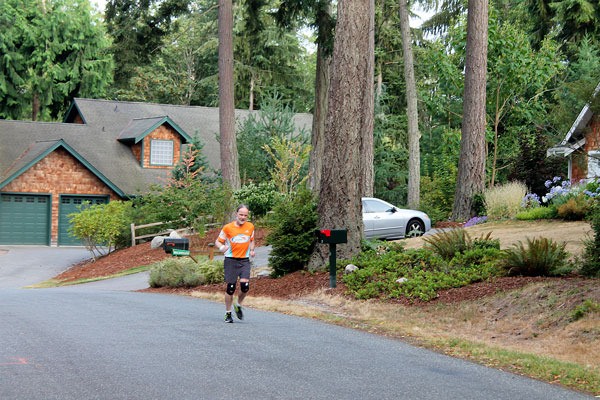 Arne Bergstrom heads off from his home on his usual running path through the Goss Lake and Lone Lake areas.