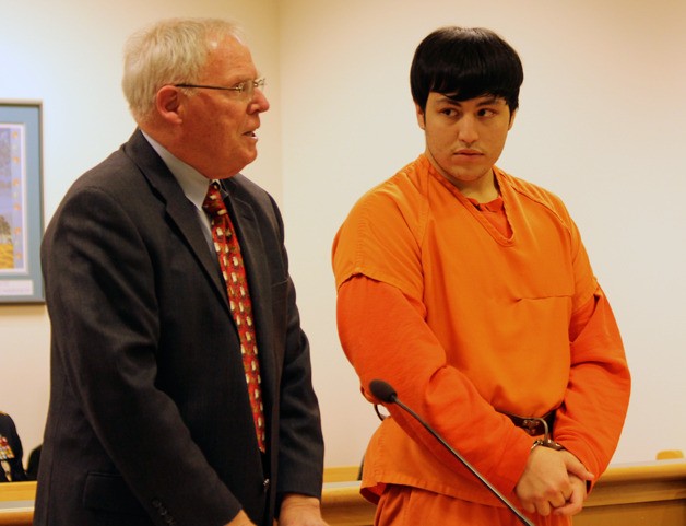 David Nunez listens to his attorney