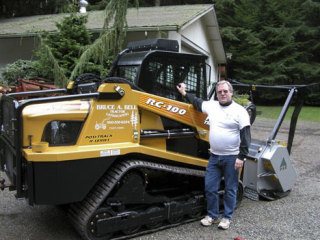 Bruce Bell offers an alternative to burning yard waste with his mulching machine.