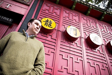 Author Jamie Ford stands in front of the China Gate Restaurant in Seattle. Novelist Ford comes to Whidbey Saturday