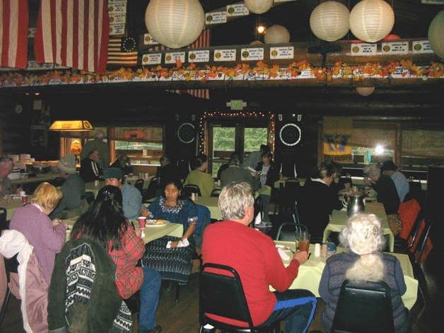 Diners at last year’s Thanksgiving dinner at American Legion Post 141 enjoy their meal.