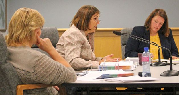 Island County Commissioner Helen Price Johnson speaks on the 2014 budget during a meeting in Coupeville this week as fellow commissioners Kelly Emerson and Jill Johnson listen.