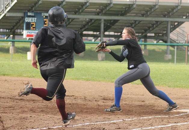 Falcon senior Abby Hodson secures the ball for an out at first base against Lakewood on March 31. South Whidbey lost 4-1 to the league’s top team.