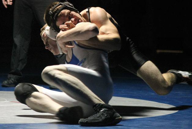 Falcon senior Andy Madsen tries to escape Granite Falls senior Tysen Campbell in the 152-pound bout Jan. 16 at South Whidbey High School.