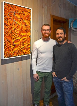 Stephen Stum and Jason Hallman stand in front of one of their latest pieces called “Desert Sand” inspired by a trip to Utah.