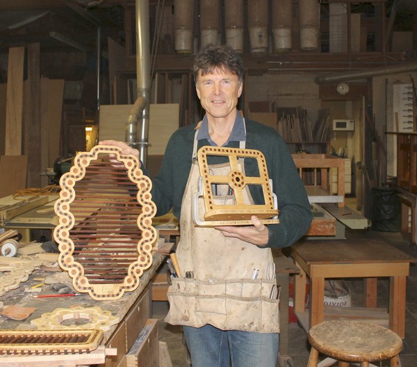 Walter Dill displays some of his eco-friendly pieces while at work in David Gray’s Langley studio.