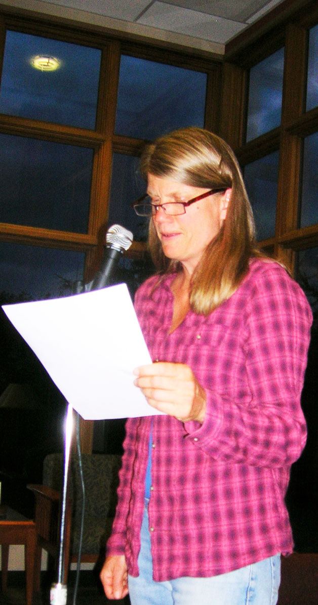 Annie Thoe reads at a Poetry Slam at the Coupeville Library. She won first place.
