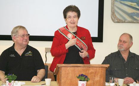 Deer Lagoon Overseer Chuck Prochaska and Grange Master Ken Schillinger listen to Washington State Grange Master June Hendrickson address a gathering on Saturday