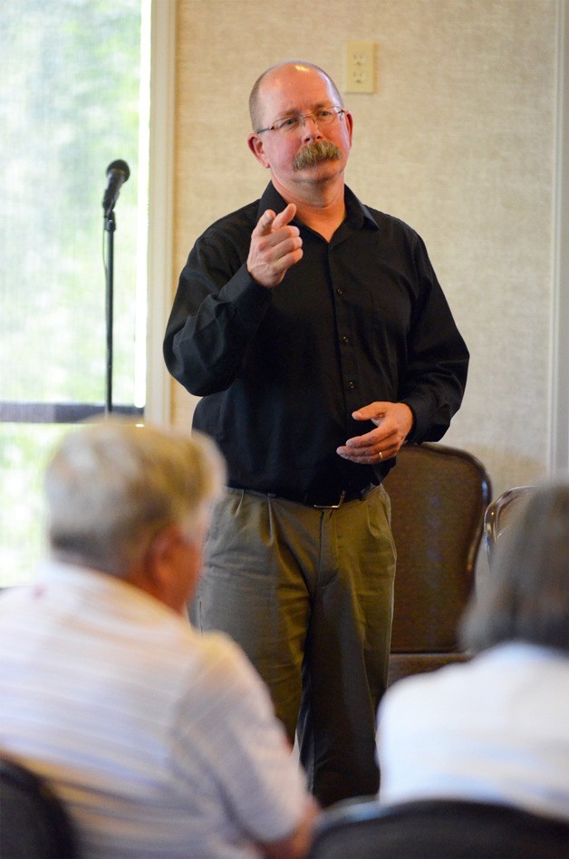 Island County Public Works Director Bill Oakes answers questions at a workshop Wednesday about a proposed assessment in Diking Improvement District 4.