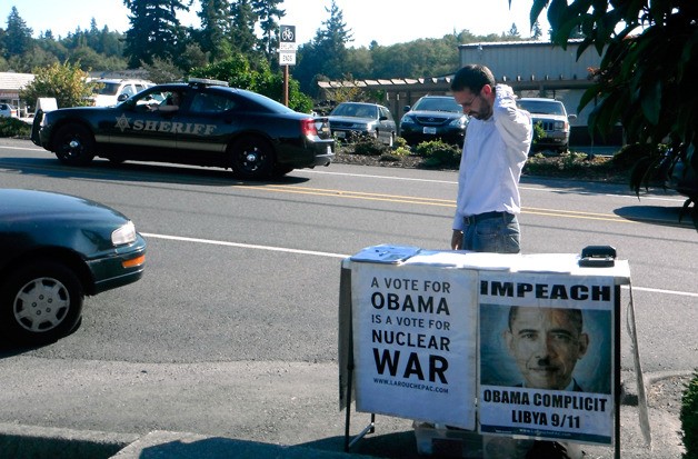 An unidentified man and woman (not pictured) associated with the LaRouche Political Action Committee became the subject of controversy in Freeland last week. Many did not welcome their ideas and police fielded complaints from both the public and the couple.