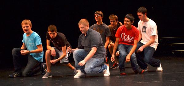 Members of Music in Motion bring it down while practicing for a song by Michael Jackson. The group will perform for the first time on Tuesday