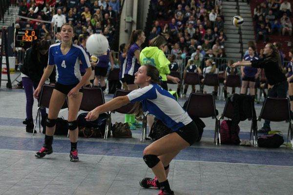 Mackenzie Hezel digs a Chelan serve in the third set at the state 1A volleyball tournament Friday. South Whidbey lost in straight sets and faced elimination in the evening match against Annie Wright.