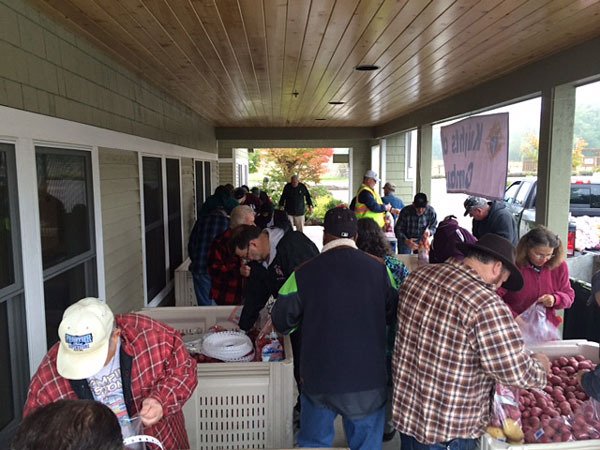 Volunteers bag potatoes at the 10th annual potato drive