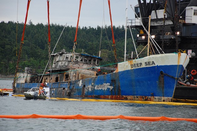 The Deep Sea is raised in Penn Cove in 2012. New legislation was signed into law this week aimed at derelict vessels.