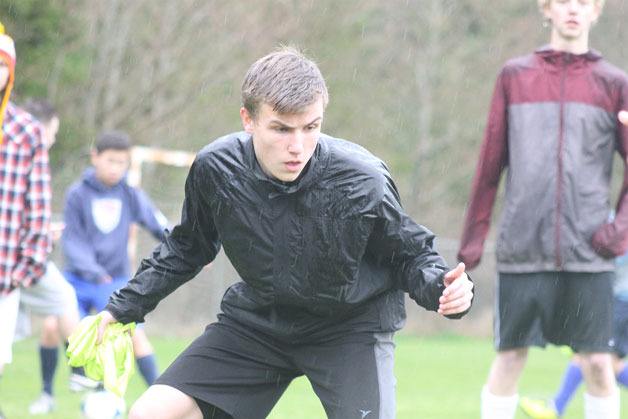 South Whidbey senior captain Lochlan Roberts participates in a keep-away drill at practice on March 4. The Falcons reached the state 1A quarterfinals last season and hope to make a deep run into the postseason this time around.
