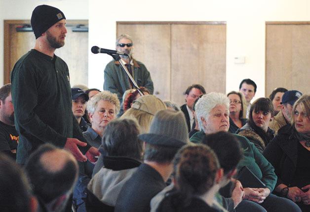Lucas Jushinski presents the details of his plan to start a medical marijuana business in Langley to city officials during a packed special city council meeting Wednesday.