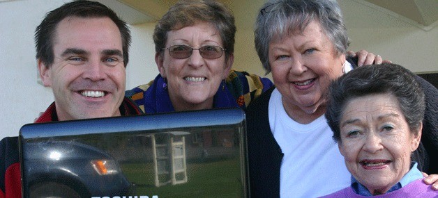 Looking over the new website SomethingToGive.org are site developer Andy McRea