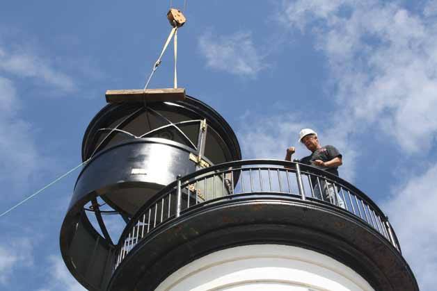 Archie Nichols of Nichols Brothers Boat Builders calls down from Admiralty Head Lighthouse to Don Carscadden