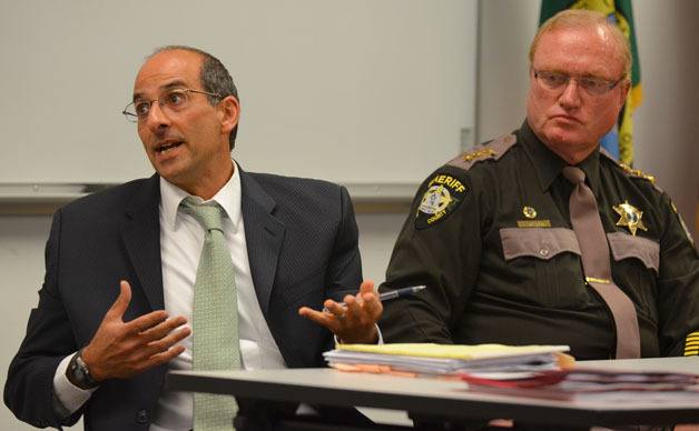 Prosecutor Greg Banks explains why his department needs more tax revenue while Sheriff Mark Brown awaits his turn to speak. They will pitch their law and justice property tax increase proposal July 10 in Freeland.
