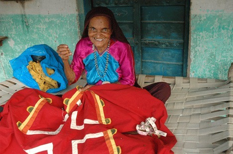 Meghiben Meriya works on one of her pieces at home in the Kutch region of Western India.