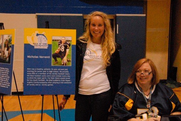 Jessica Manca (left) helps to register students for heart screenings at South Whidbey HIgh School.