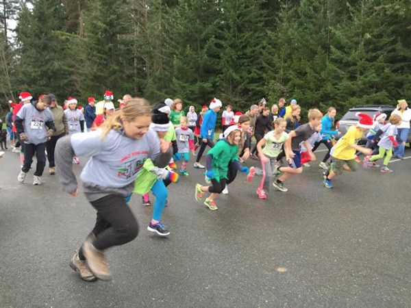About 80 runners gathered for Langley Middle School’s annual Elf Chase fundraiser on Saturday