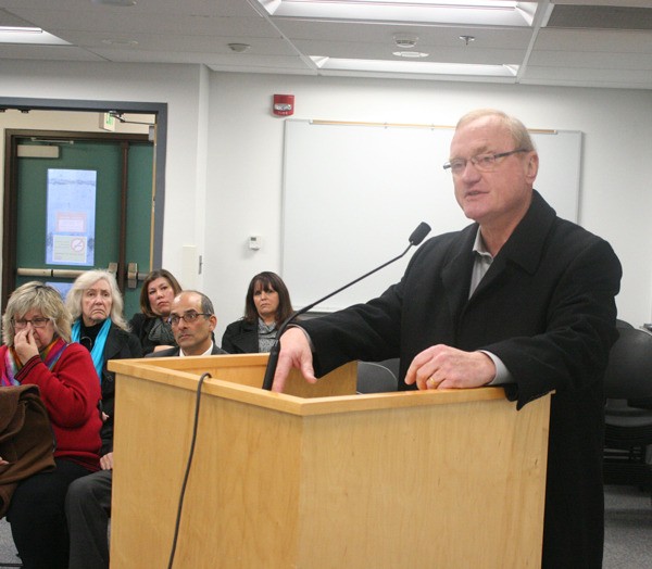 Island County Sheriff Mark Brown speaks to the commissioners Monday about a pay raise for elected officials.