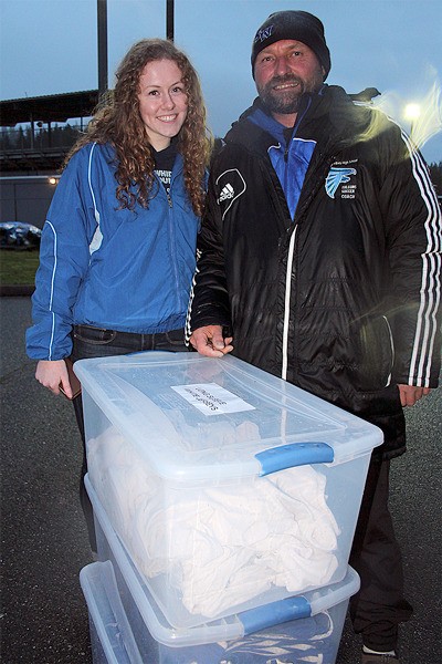 Emma Lungren and Joel Gerlach were two of the South End residents to donate goods and aid to Haiti.