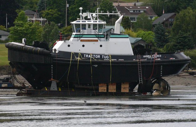 A tug boat prepares for launch at the docks of Nichols Brothers Boat Builders in Freeland on Wednesday