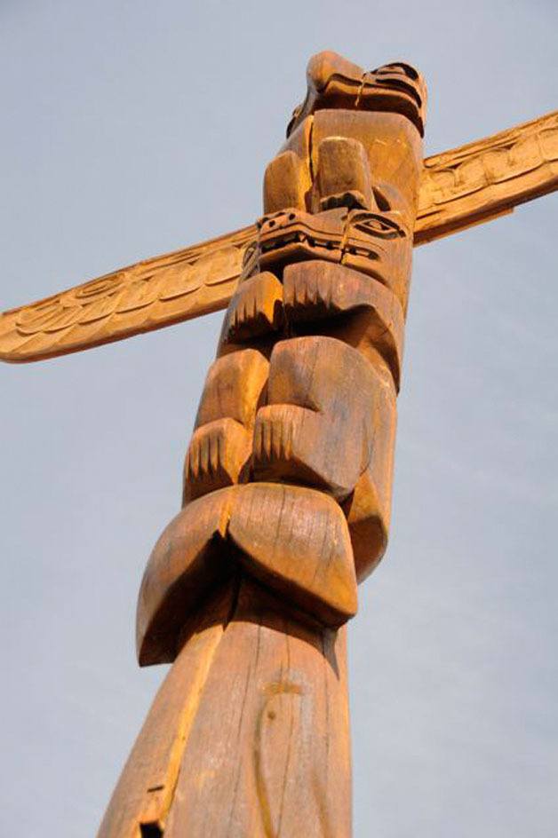 Oscar Leighton Hilbert’s hand-carved totem has been raised outside Community Thrift in Freeland.