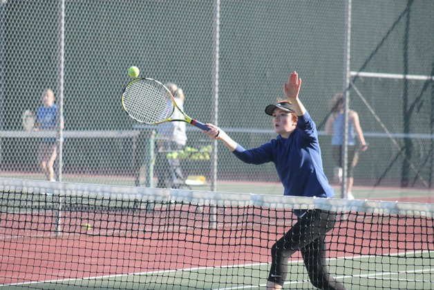 Anna Lynch volleys a shot back across the net during a recent practice.