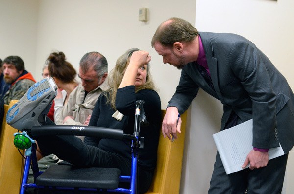 Michelle Nichols speaks with her attorney